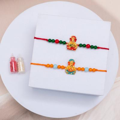 Set of 2 Ganesha Rakhis with 2 Dairy Milk Bars